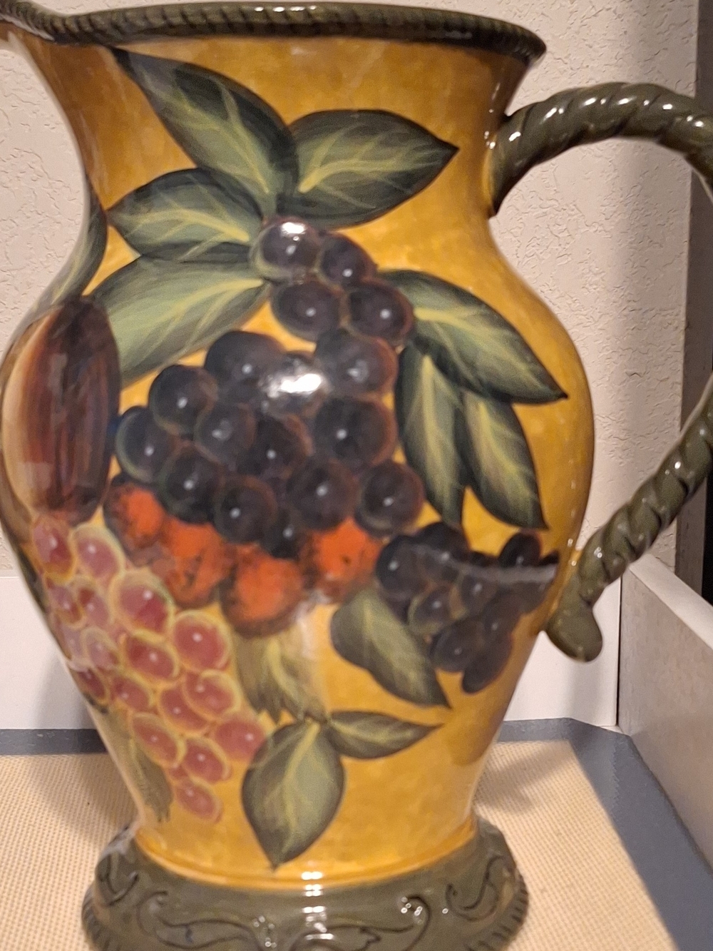 Certified International Yellow Ceramic Pitcher with Fruit and Green Leaves